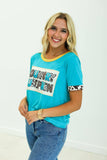 Country Bumpkin Patch Turquoise Ringer Tee: Turquoise