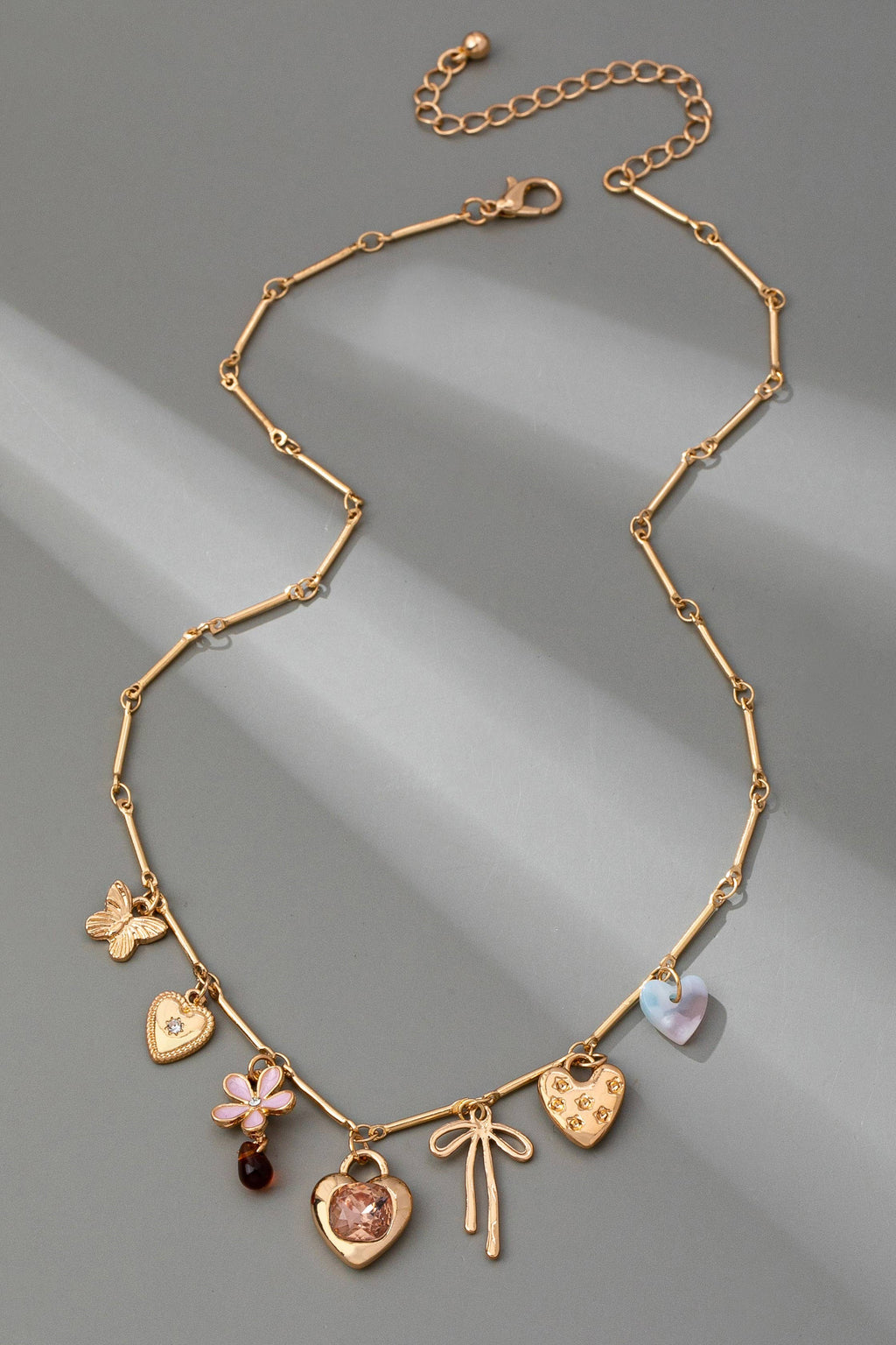 CHARM NECKLACE-HEARTS FLOWER BOW BUTTERFLY | 80N92639: GOLD