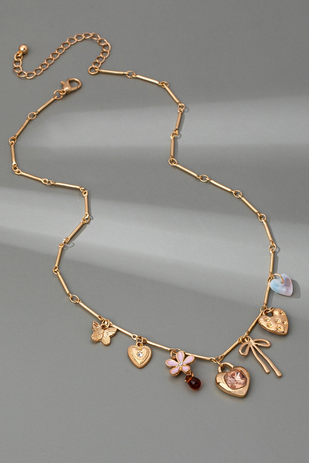 CHARM NECKLACE-HEARTS FLOWER BOW BUTTERFLY | 80N92639: GOLD