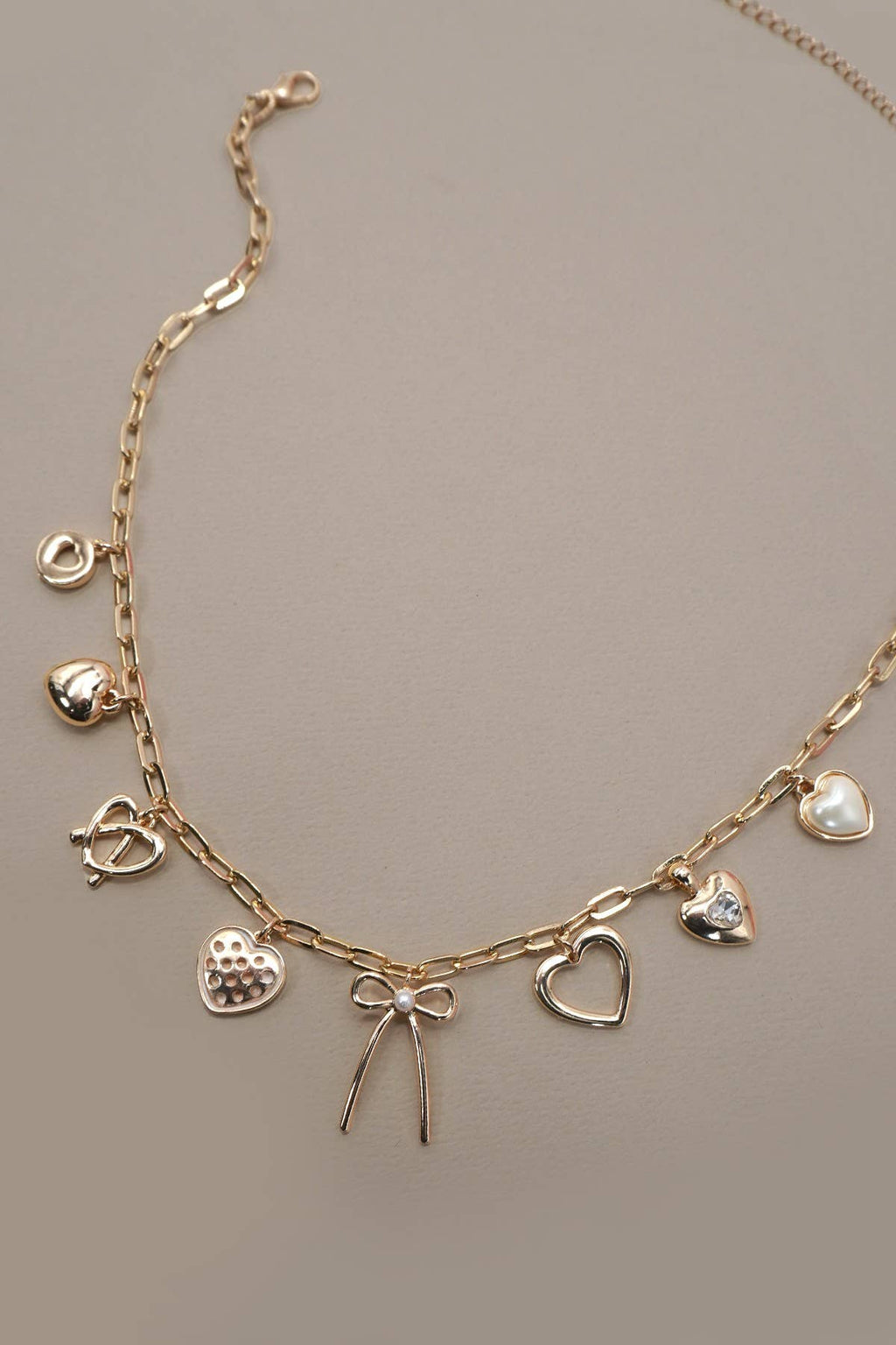 CHARM NECKLACE-BOW MULTI HEARTS PEARL CHARMS | 80N91426: Gold