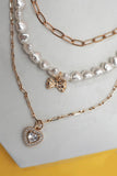 MULTI PEARL LAYER SET BOW HEART PENDANT NECKLACE | 25N942: GOLD