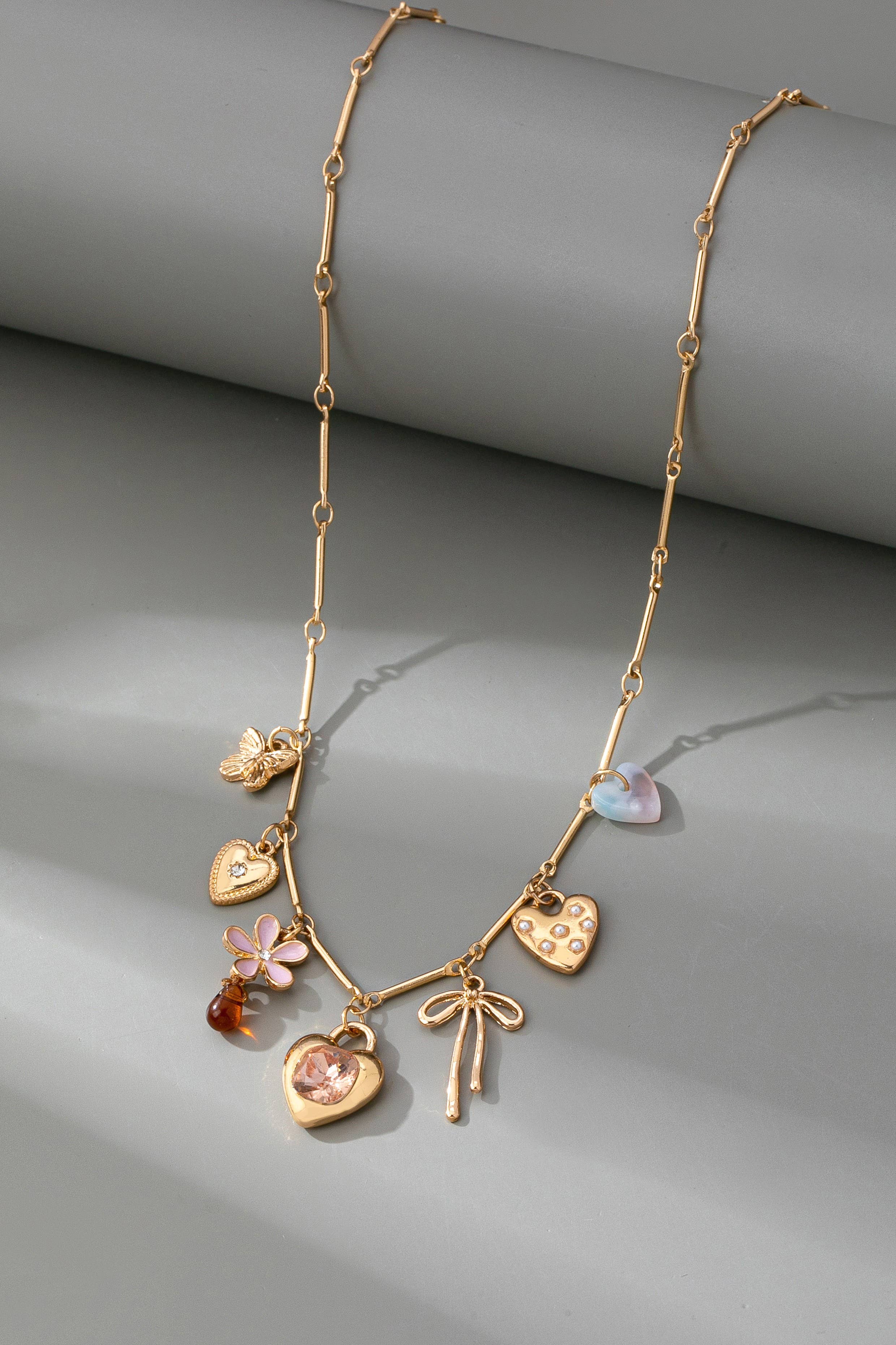 CHARM NECKLACE-HEARTS FLOWER BOW BUTTERFLY | 80N92639: GOLD